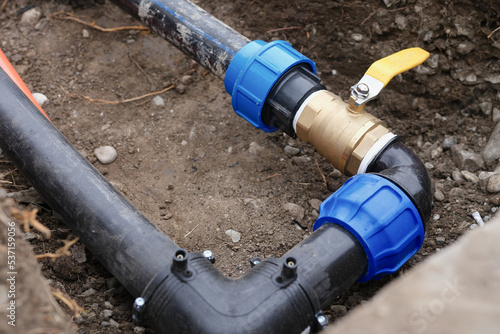 Plumbing water drainage installation in trench of ground