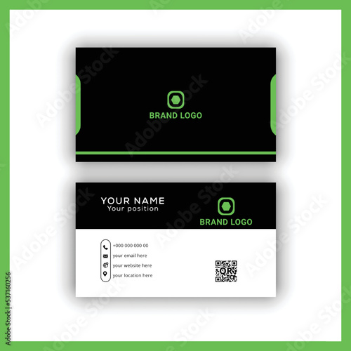 Professional elegant black white and green modern business card