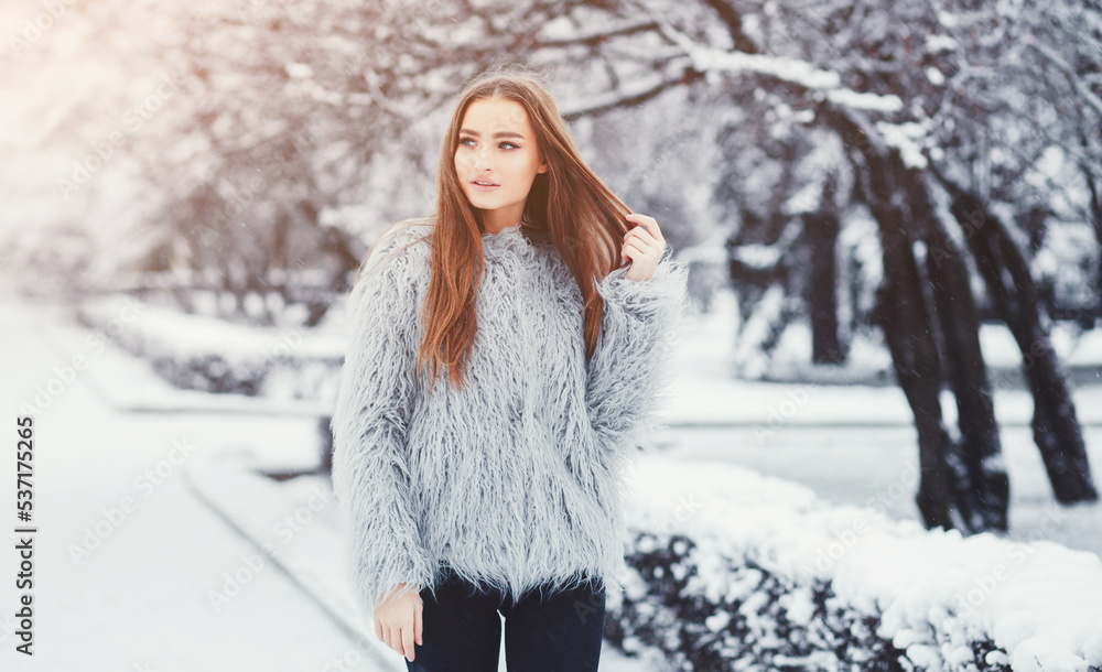 Winter portrait of young beautiful brunette Winter portrait of young beautiful brunette