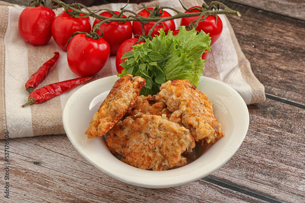 Fried salmonn cutlet in the bowl Fried salmonn cutlet in the bowl