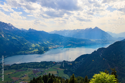 Breathtaking aerial view of Lake Thun and Swiss Alps from Harder Kulm viewpoint, Switzerland © olyasolodenko