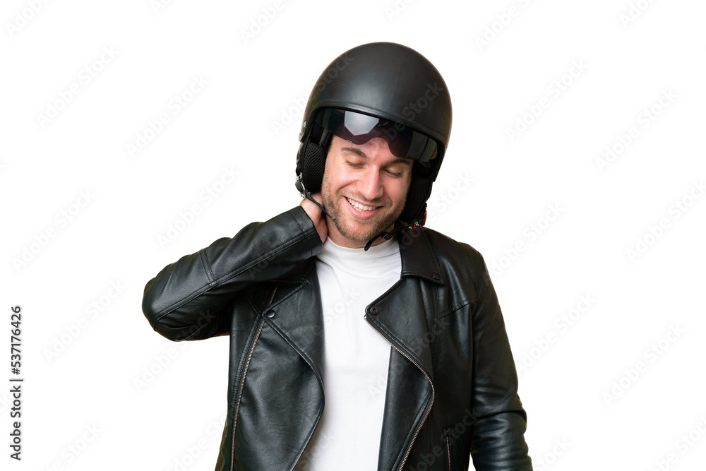 Young caucasian man with a motorcycle helmet isolated on green chroma background laughing Young caucasian man with a motorcycle helmet isolated on green chroma background laughing