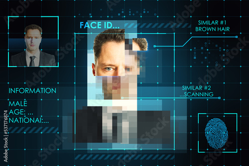 Face recognition and authentication concept with personal data of handsome man and fingerprint on abstract dark background photo