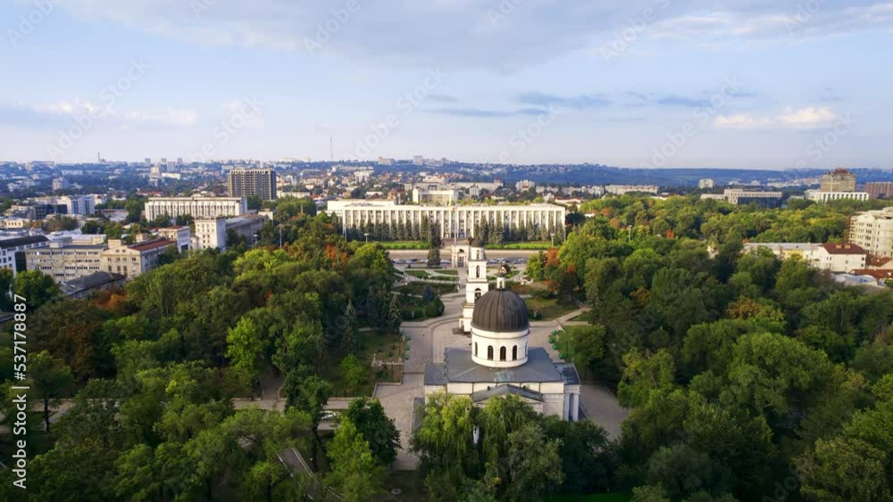 Aerial drone view of Chisinau downtown at sunrise, Moldova. Panoramic view of Central Park, Cathedral, Goverment a lot of greenery, buildings Aerial drone view of Chisinau downtown at sunrise, Moldova. Panoramic view of Central Park, Cathedral, Goverment a lot of greenery, buildings