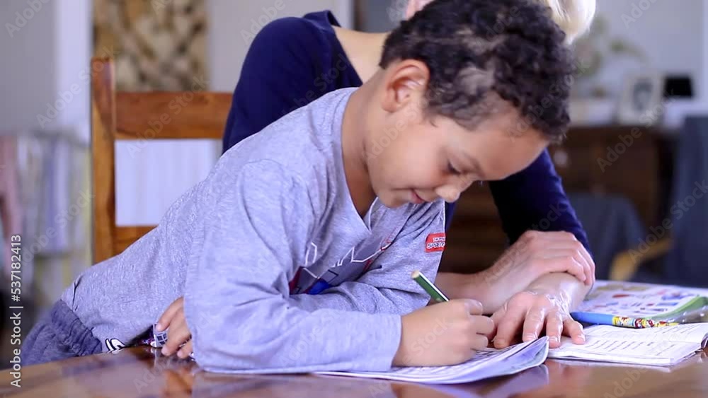 teacher and child reading a book together at school on white background with people stock footage teacher and child reading a book together at school on white background with people stock footage