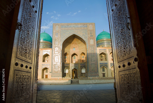 The décor of the Miri-Arab madrassah has dominance of different stone mosaics of exquisite work with geometric, vegetative and calligraphic writings and patterns.