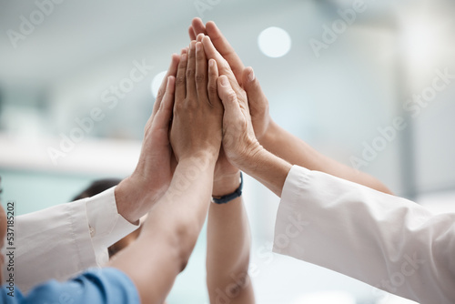 High five, teamwork and doctors hands in collaboration for mission, goal or team building together. Mindset, target or medical group with trust, motivation or support for vision, winning or success. photo
