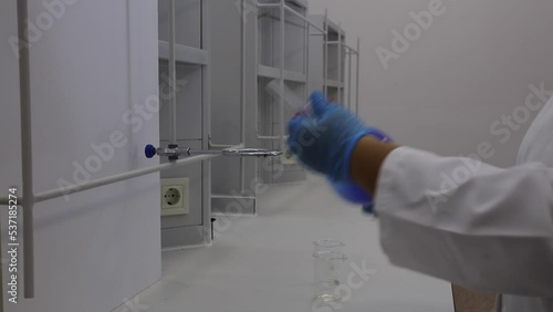Separating funnel laboratory glassware used in liquid-liquid extractions to separate or partition the components of a mixture into two immiscible solvent phases,Chemical extraction of organic compound photo
