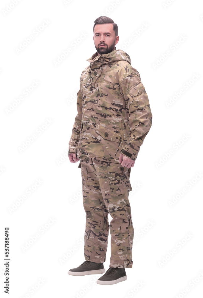 in full growth. a man in autumn camouflage . isolated on white in full growth. a man in autumn camouflage . isolated on white