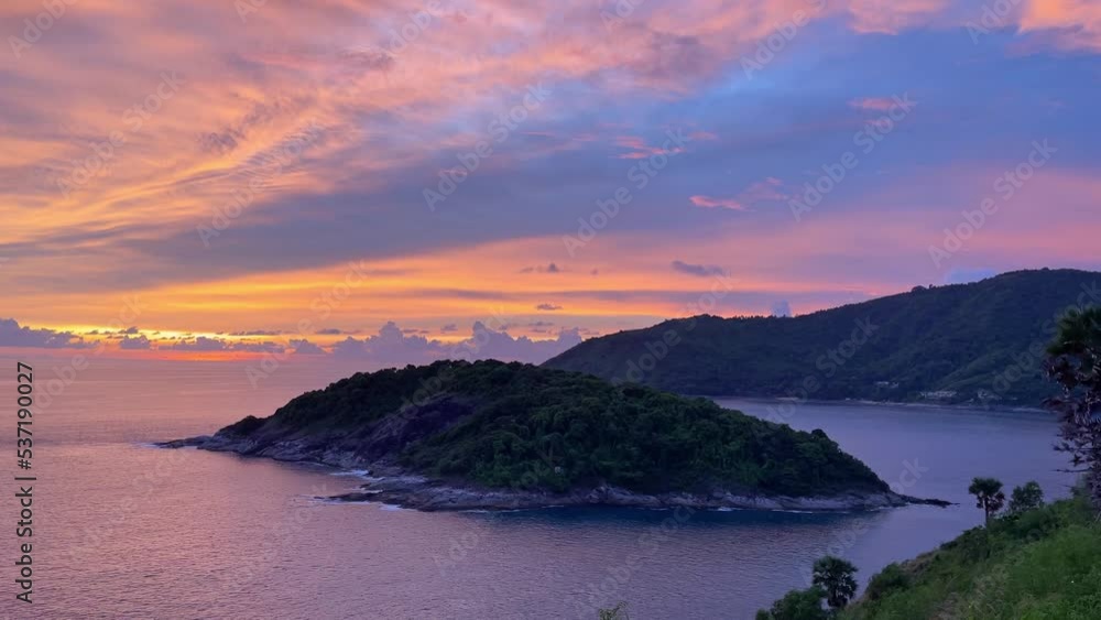 Peaceful sunset over ocean in Phuket island, Thailand. Colorful dusk over Andaman sea, summer vacation, travel destination concepts Peaceful sunset over ocean in Phuket island, Thailand. Colorful dusk over Andaman sea, summer vacation, travel destination concepts