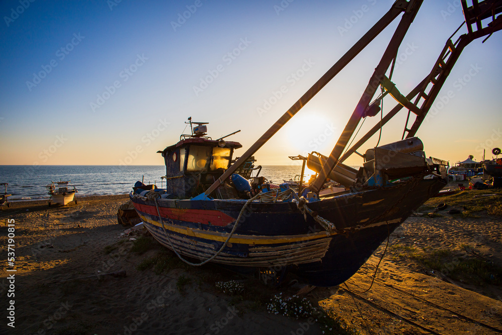 Boat by the sea of rome Boat by the sea of rome