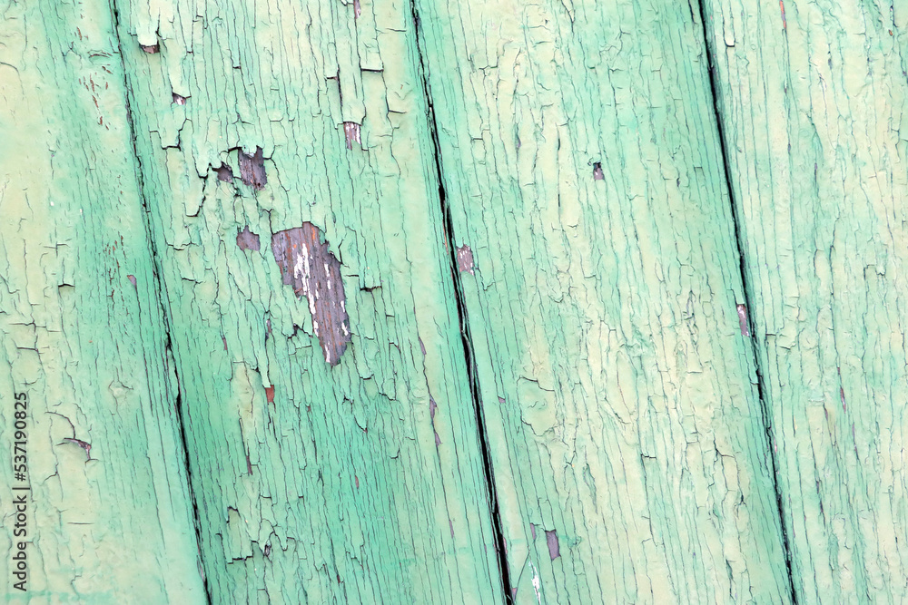 Old peeling paint on a wooden background, wood texture. Old peeling paint on a wooden background, wood texture.