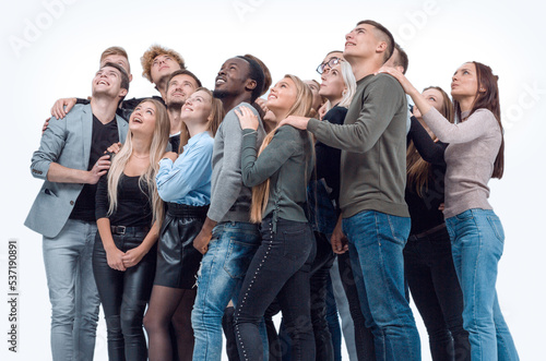 large group of diverse young people looking up hopefully