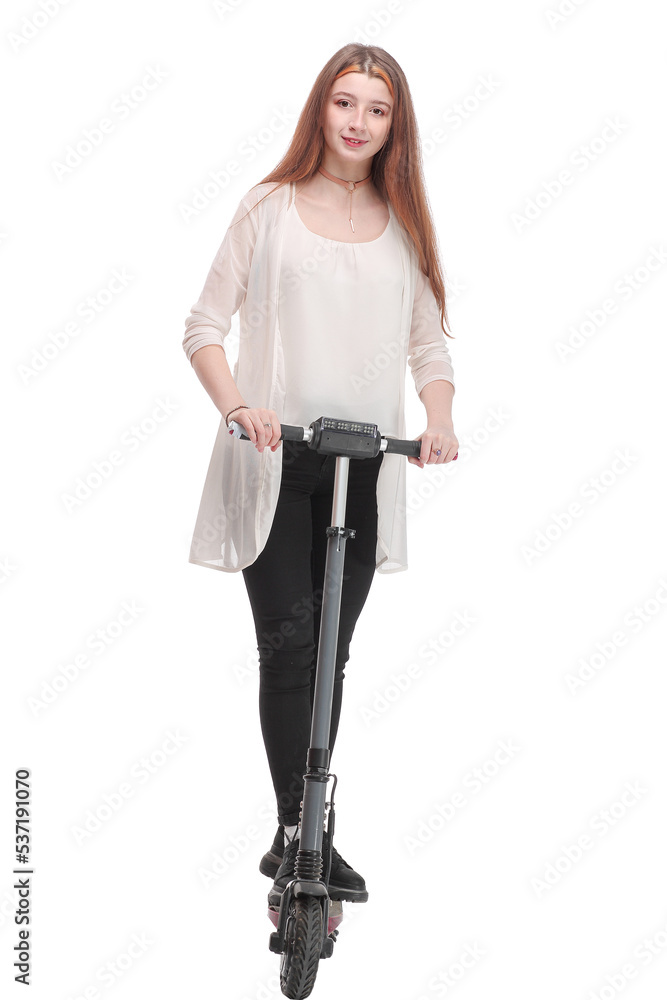 Front ivew of joyful woman riding a kick scooter Front ivew of joyful woman riding a kick scooter