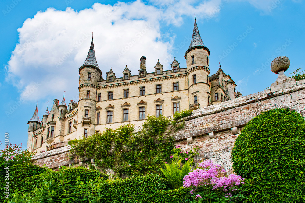 Postcard landscape 
Dunrobin Castle & Gardens is a castle on the east coast of Scotland. It is the ancestral seat of the Clan Sutherland.  United Kingdom
