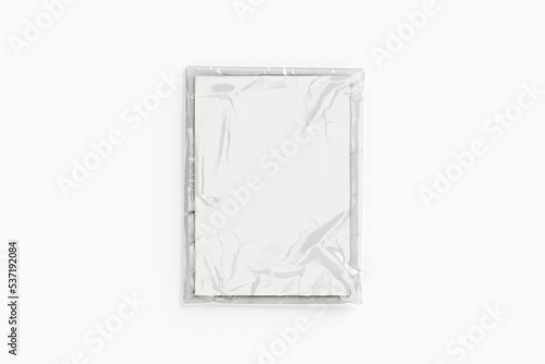 Blank magazine in foil packaging mockup isolated on white background. 3d rendering.