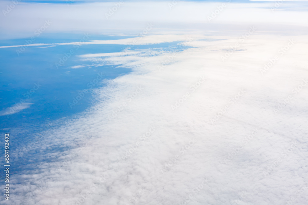 Flight over white clouds . Outer space view from the aircraft 