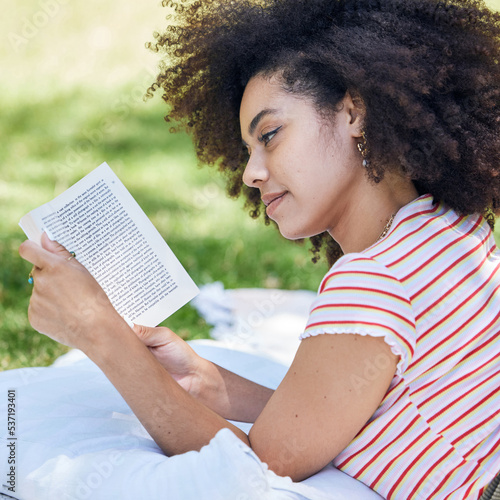 Принти на полотні Black woman reading book, relax in park and picnic blanket with novel in nature