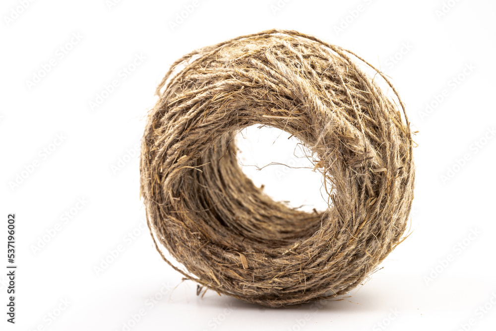 Jute twine isolated on white background. hank of twine close-up. Jute twine isolated on white background. hank of twine close-up.
