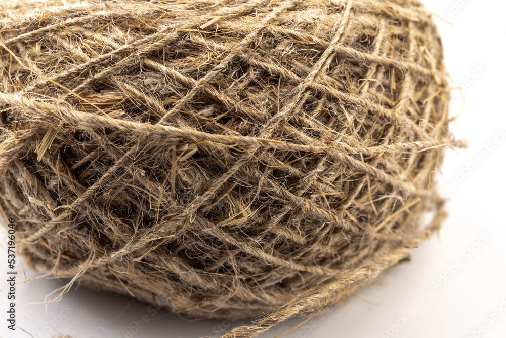 Jute twine isolated on white background. hank of twine close-up. Jute twine isolated on white background. hank of twine close-up.