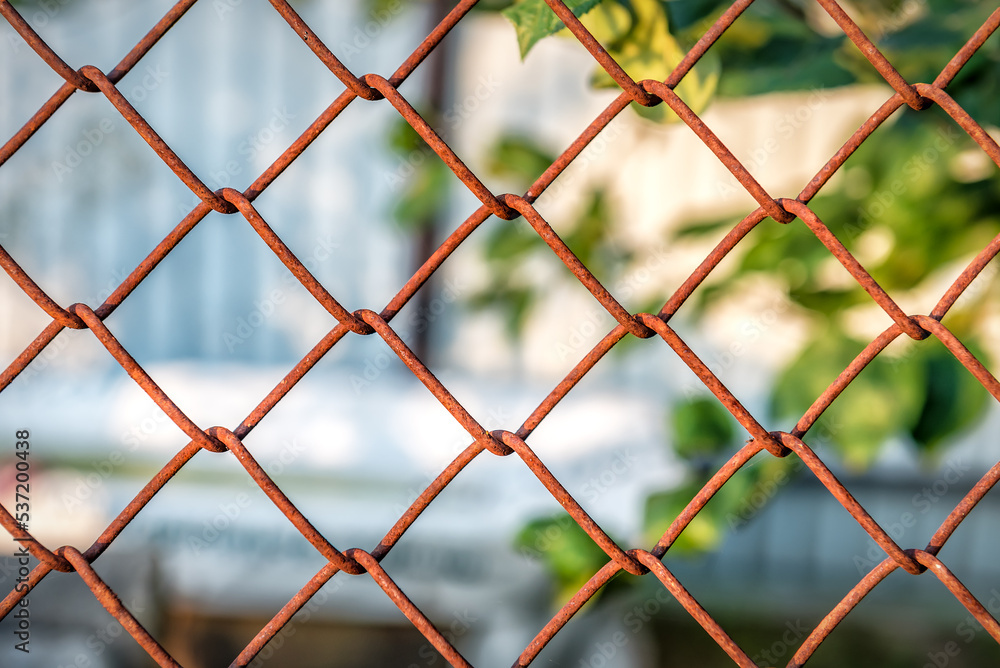 Fototapeta premium Old rusty metal wire fence