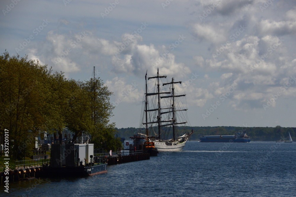 Obraz premium Promenade at the Canal between the North Sea and the Baltic Sea, Holtenau, Kiel, the Capital City of Schleswig - Holstein