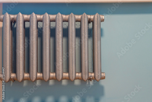 Cast iron radiator of water on the wall