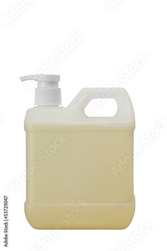 Closeup gallon bottle of Yellow soap with refill  droper pump isolated on white background