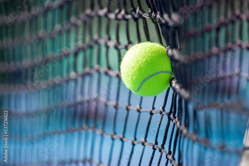 tennis ball hitting a tennis net © Павел Мещеряков