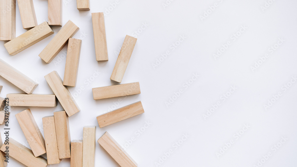 Pile of small wooden blocks for Jenga table game Pile of small wooden blocks for Jenga table game