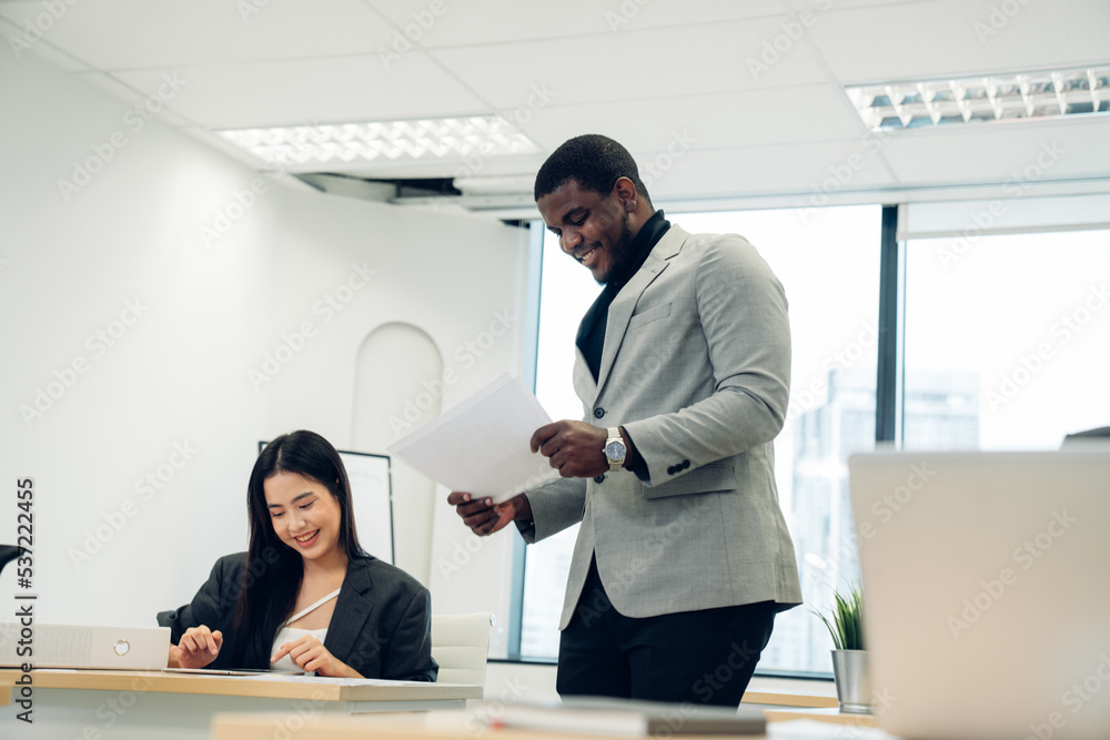 Leader or businessman sends documents male colleague in the creative office. Leader or businessman sends documents male colleague in the creative office.