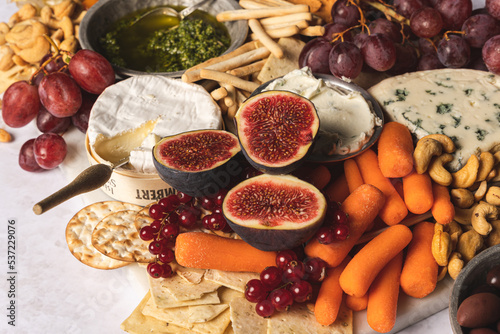 Side view of a cheese platter on white background