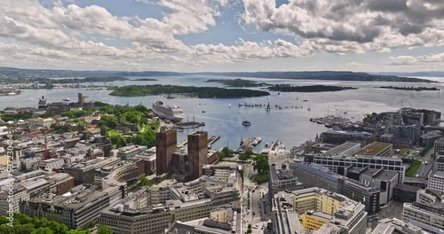 Oslo Norway v1 cinematic drone flyover downtown capturing urban cityscape of sentrum central neighborhood capturing pipervika bay with fjord views on a sunny day - Shot with Mavic 3 Cine - June 2022 photo
