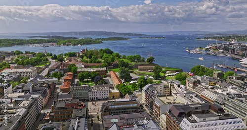 Oslo Norway v35 cinematic low level drone flyover downtown sentrum towards waterside historical landmark akershus fortress with fjord views on sunny day in summer - Shot with Mavic 3 Cine - June 2022 photo