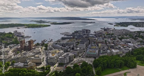 Oslo Norway v3 panoramic panning view drone fly across sentrum district capturing fjord seascape and downtown cityscape with famous landmark royal palace - Shot with Mavic 3 Cine - June 2022 photo