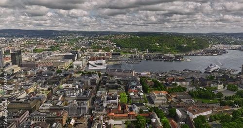 Oslo Norway v4 panoramic view drone flyover across sentrum and gamle neighborhood capturing bustling downtown cityscape and waterfront harbor from above at daytime - Shot with Mavic 3 Cine - June 2022 photo