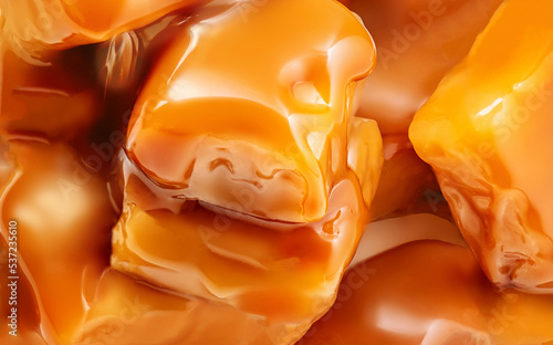 Flowing caramel  background.  Caramel with toffee sauce. Pattern, Wallpaper photo