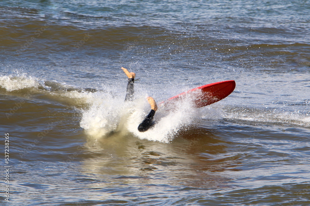 Surfing on high waves on the Mediterranean Sea in northern Israel. Surfing on high waves on the Mediterranean Sea in northern Israel.