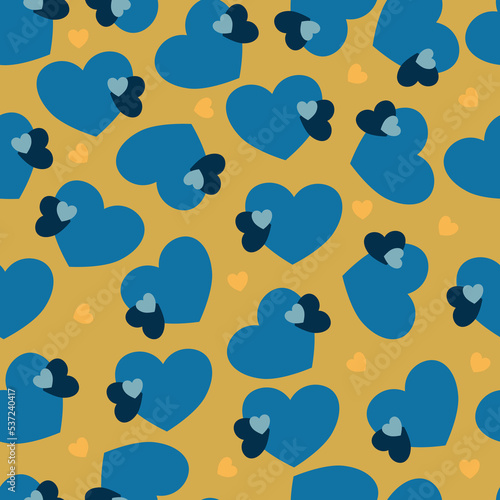 Yellow and blue seamless pattern background. With various sized hearts. Perfect for fabric, scrapbooking, quilting, wallpaper and many more projects.