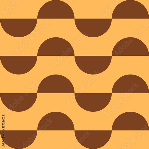 Patrón de medios círculos en marrón chocolate sobre fondo naranja o mostaza