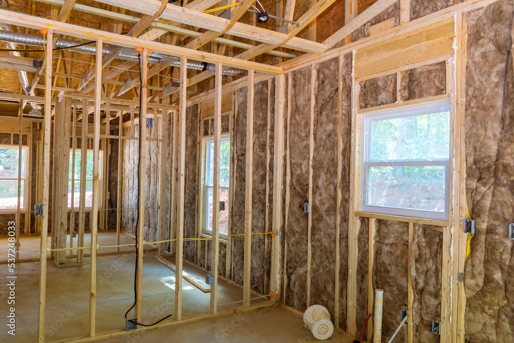 New residential under construction beams framing home wooden building ...