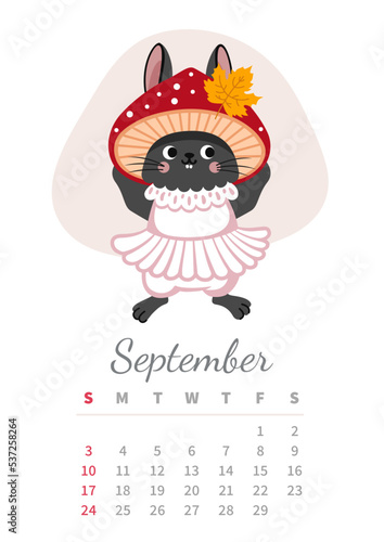 September 2023 calendar vertical page. Chinese black water rabbit, symbol of year. Cute autumn bunny in fly agaric mushromm costume. A4 wall calendar design. Vector illustration. photo