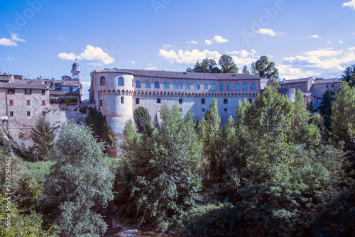 Urbania, (PU), Italy - August 10, 2022: The "Ducal Palace" of Urbania (Marche, Italy) over the river Metauro, Urbania, Pesaro Urbino, Marche, Italy, Europe....
