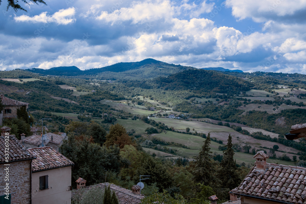 Obraz premium San Leo, (RN), Italy - August 10, 2022: The hills and landscape view from San Leo village, San Leo, Rimini, Emilia Romagna, Italy, Europe