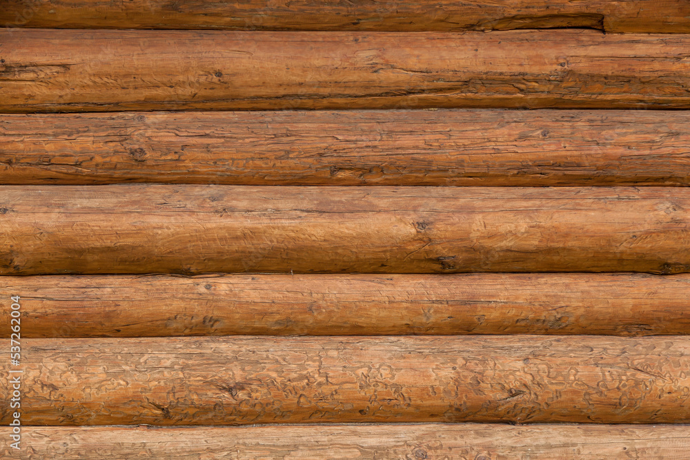 Texture of the wall with wooden planks Texture of the wall with wooden planks