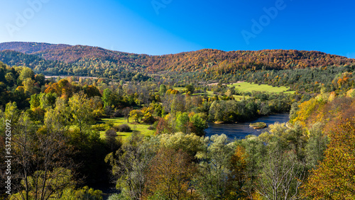 The San River Valley. The village of Tworylne, Bieszczady Mountains, Poland. Colorful autumn mountain landscape.