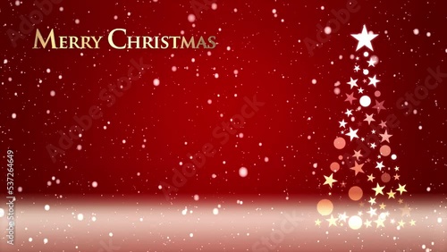 クリスマスツリーと色のついた背景に雪が舞い、クリスマスの文字が浮かび上がる