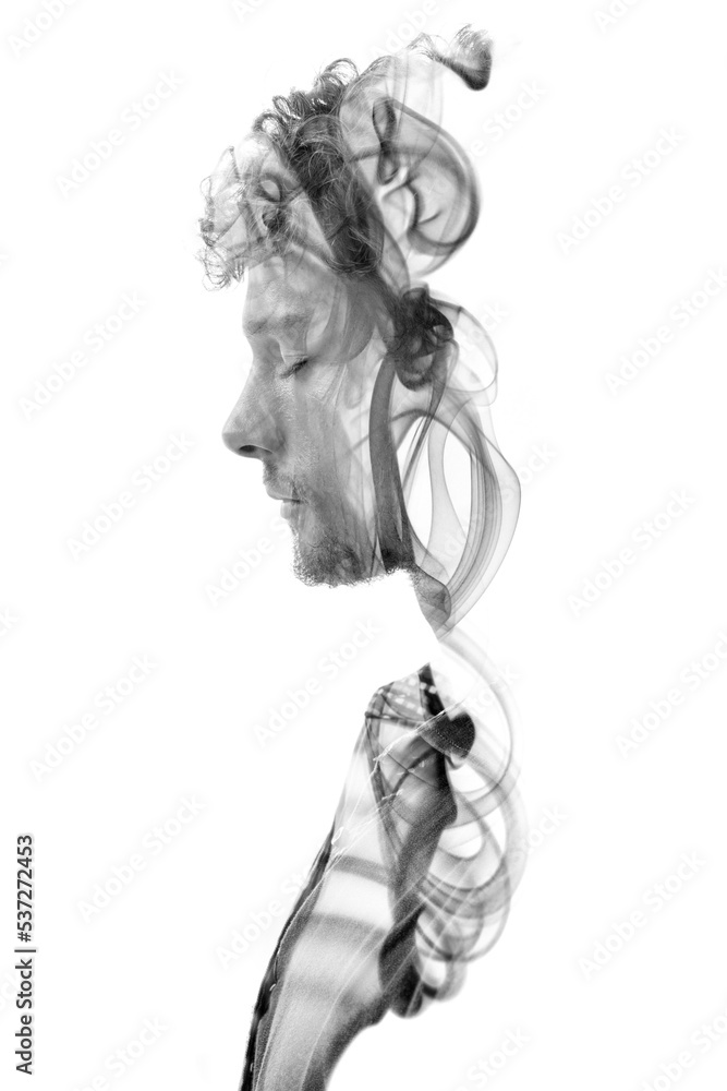 Fototapeta premium Double exposure portrait combined with swirls of smoke