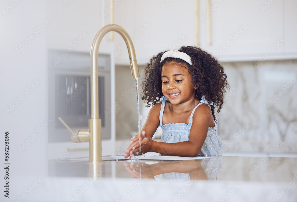 Fotka „Little girl, washing and hands with smile in the kitchen for