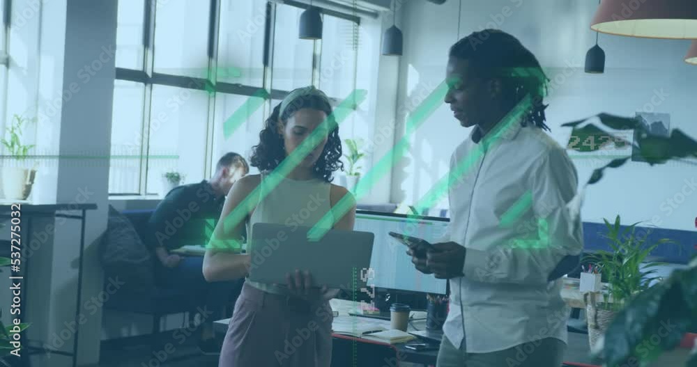 Animation of data processing over diverse business people in office Animation of data processing over diverse business people in office
